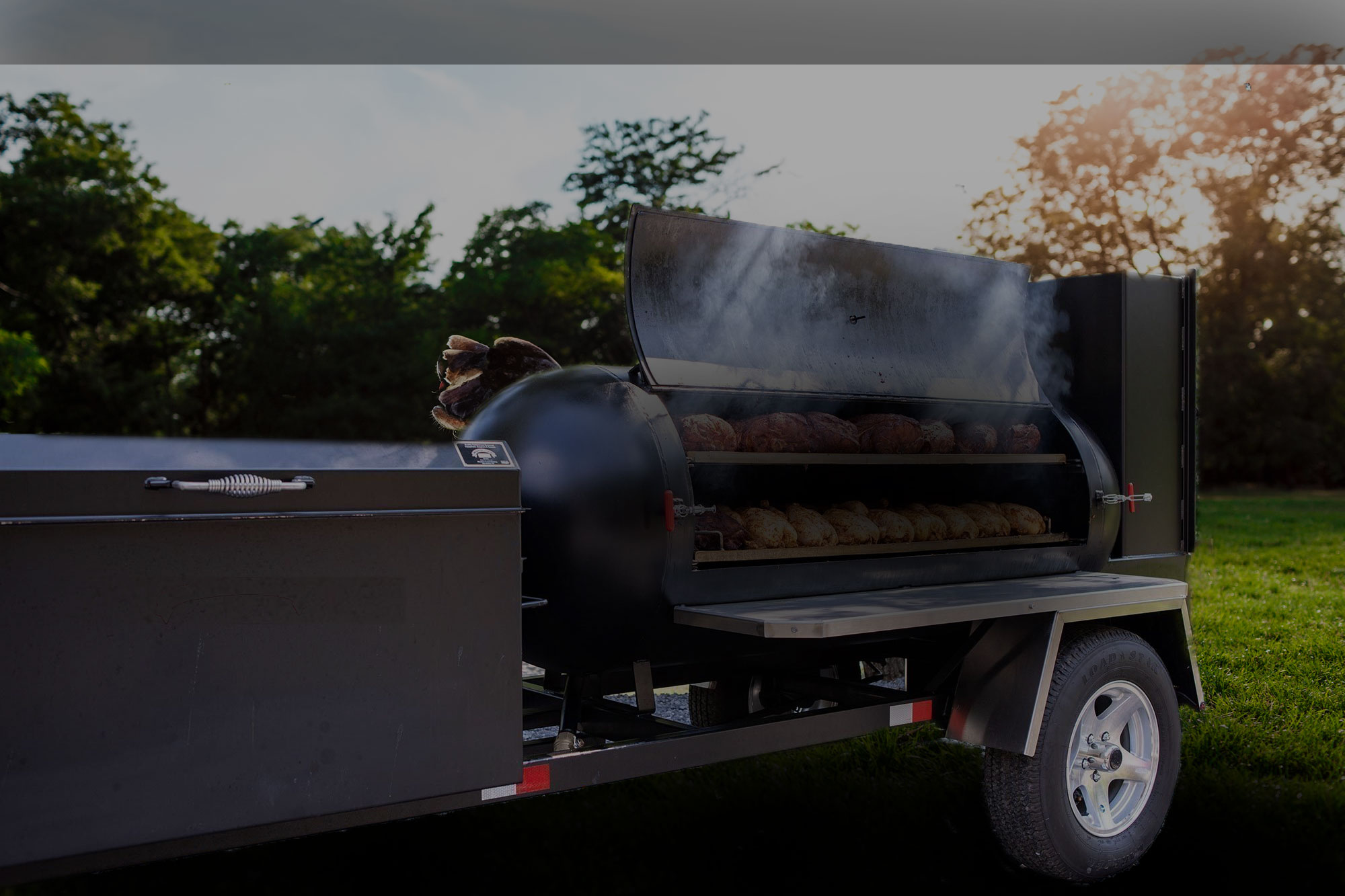 A bbq smoker in the park