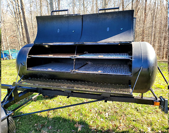 >>Iron Chef Grill. Specs: dial propane burners with tank