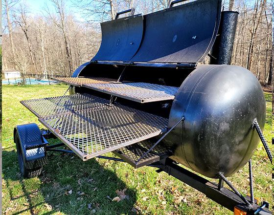 >Iron Chef Grill. Specs: dial propane burners with tank,